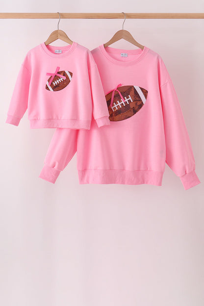 Pink football sequin mom&me top
