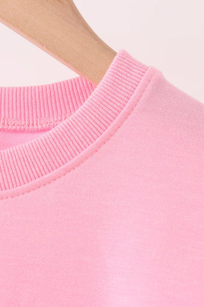 Pink football sequin mom&me top